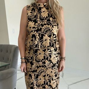 2 piece skirt and shirt black and gold outfit